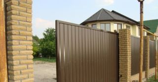 Купить откатные ворота из профнастила Людиново, цена от 1749 руб.
